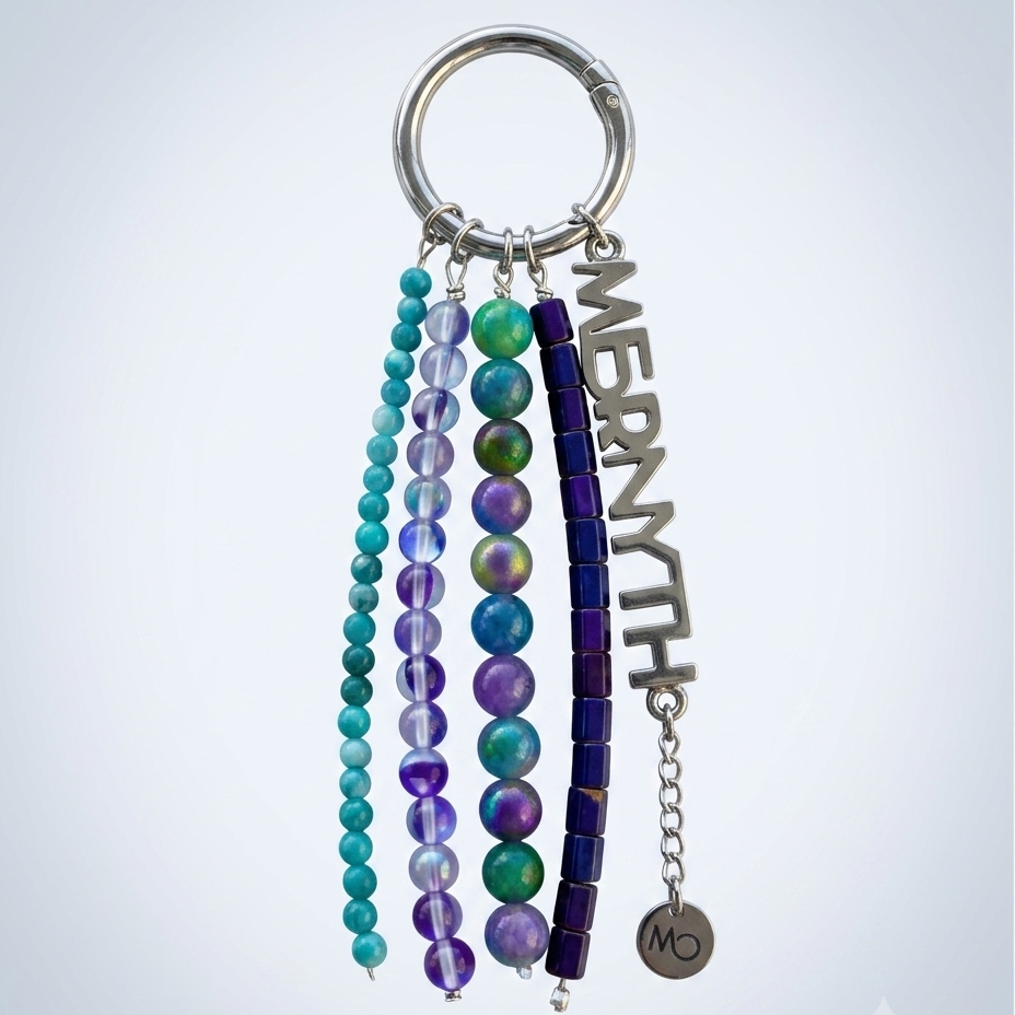 The Peacock beaded bag charm in teal and violet glass — Mernyth