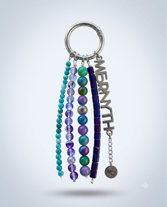 The Peacock beaded bag charm in teal and violet glass — Mernyth